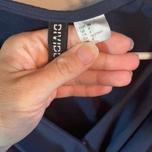 H & M romper, worn a couple times. Lace is decent shape, very flattering! Navy